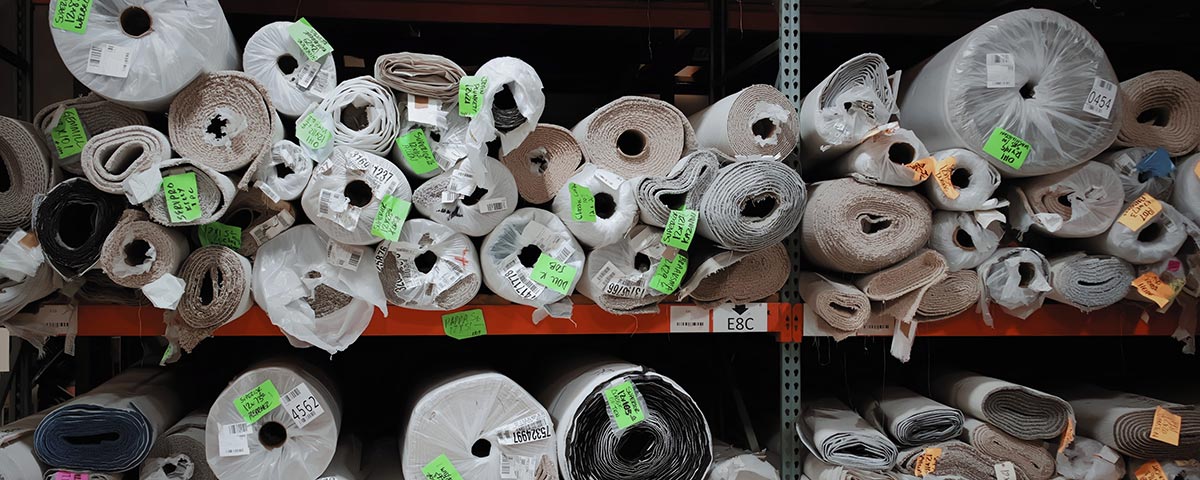 Bolts of excess textiles in a spinning mill.